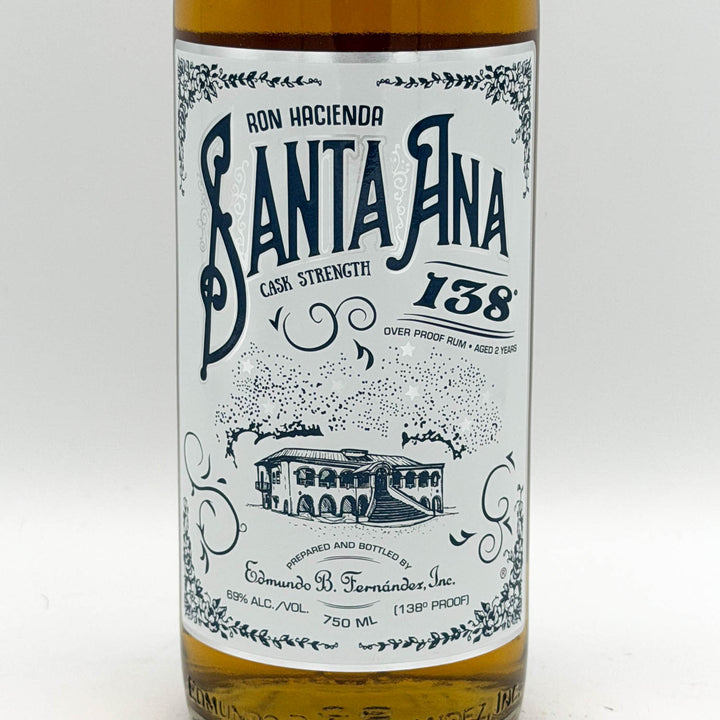 Bottle of Ron Hacienda Santa Ana 138 rum with a detailed label on a white background