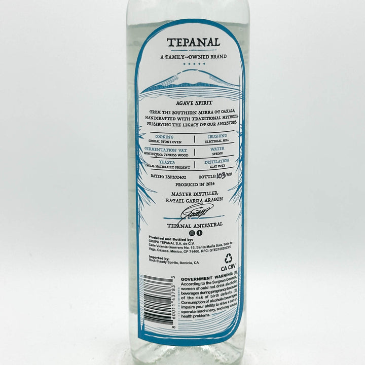 Tequila bottle with label on a white background