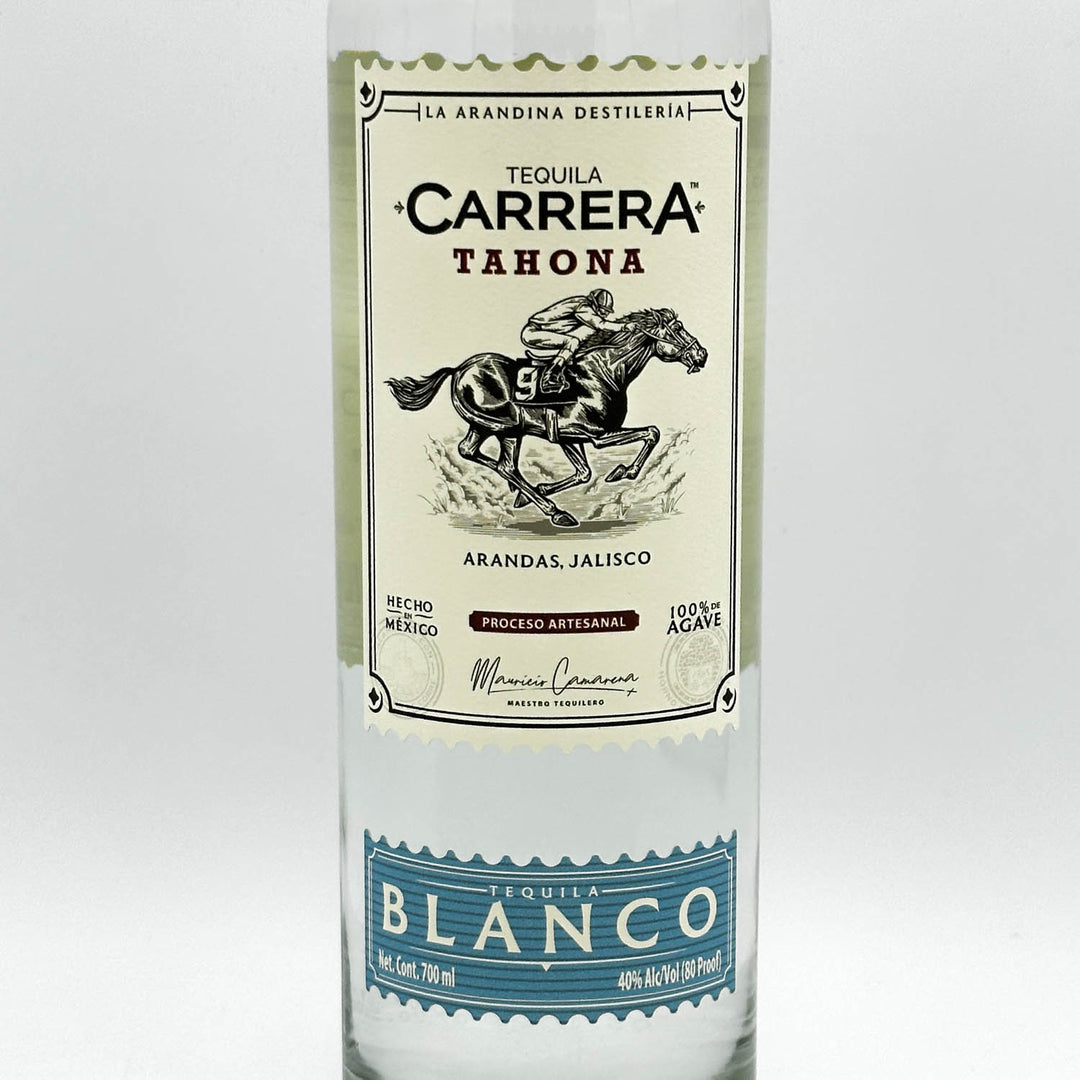 Tequila Carrera Tahona bottle with label on a white background