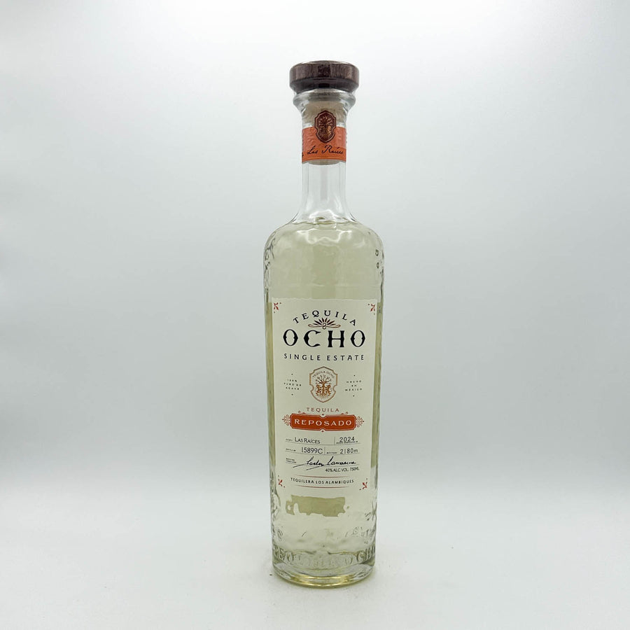 Ocho Tequila bottle on a white background
