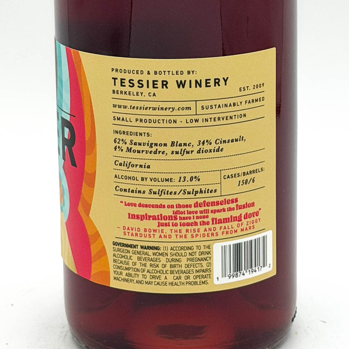 Bottle of Tessier Winery wine with a colorful label on a white background