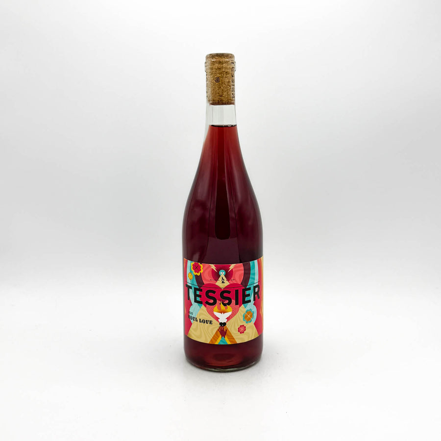 Bottle of red wine with a colorful label on a white background
