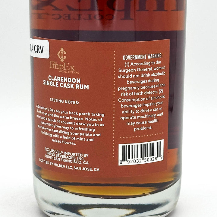 Back label of a Clarendon Single Cask Rum bottle with text and a barcode.