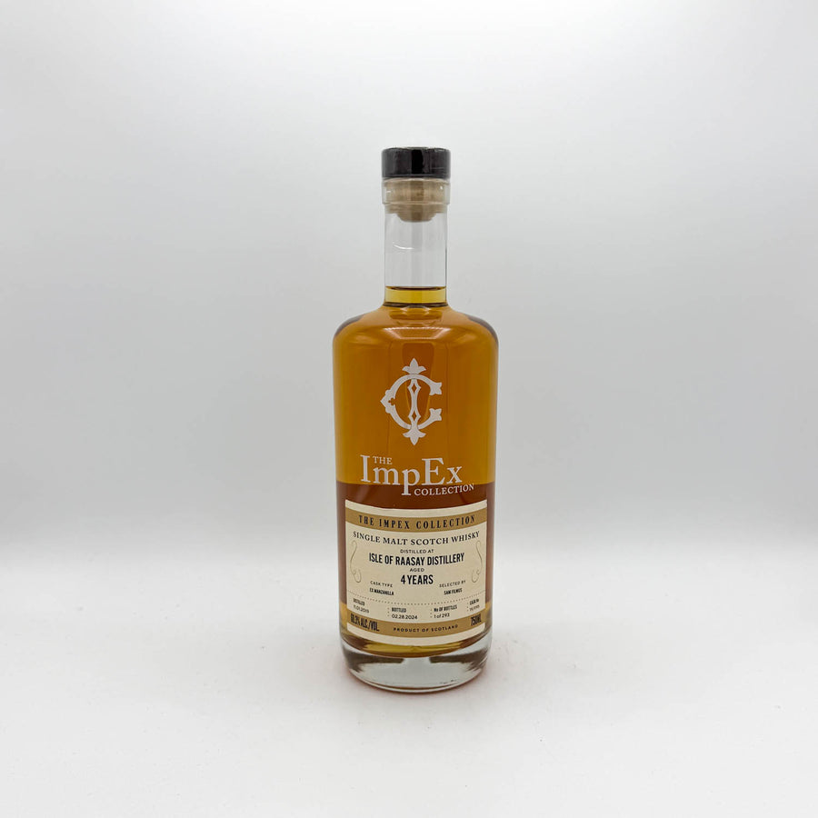 Whiskey bottle with a visible label on a white background