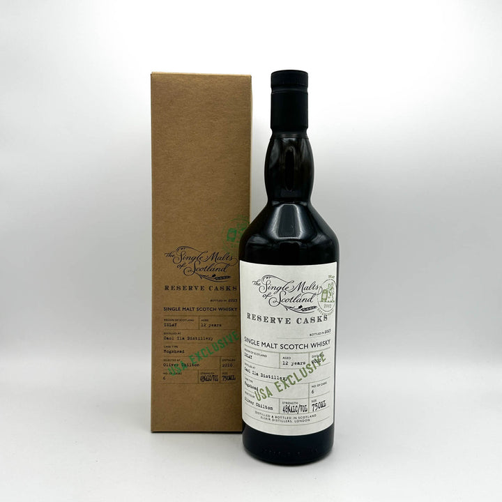 Bottle of Single Malt Scotch Whisky with a cardboard box on a white background