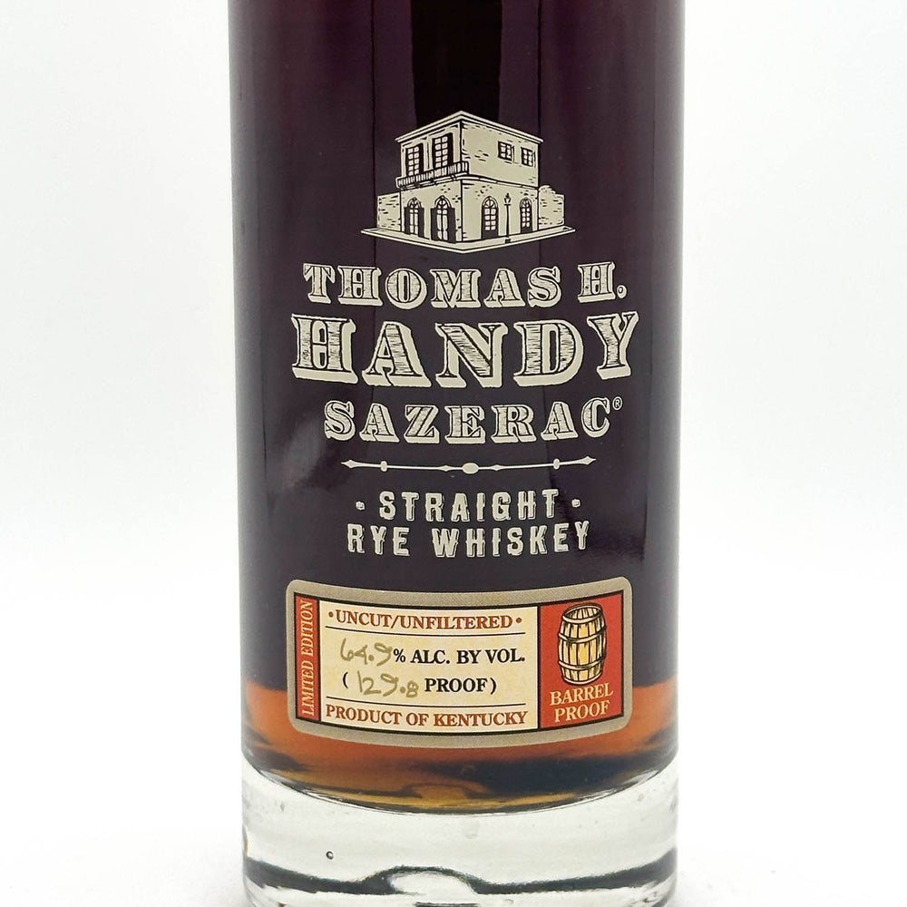 Bottle of Thomas H. Handy Sazerac Straight Rye Whiskey on a white background