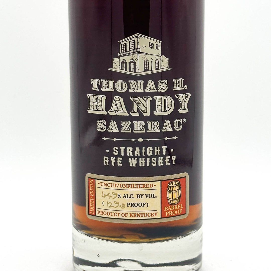 Bottle of Thomas H. Handy Sazerac Straight Rye Whiskey on a white background