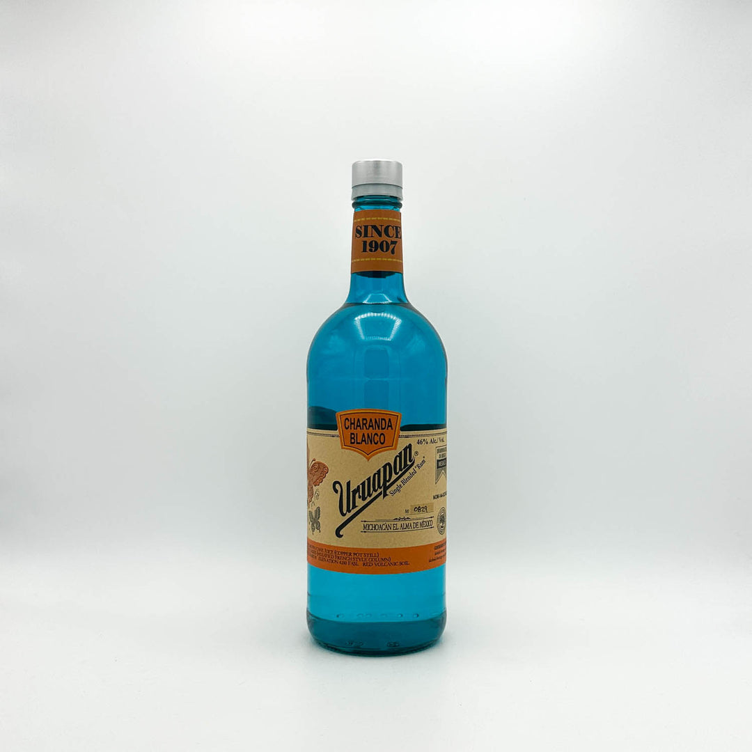 Blue bottle with a colorful label on a white background