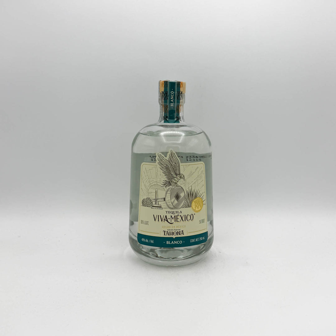 Tequila bottle with label on a white background