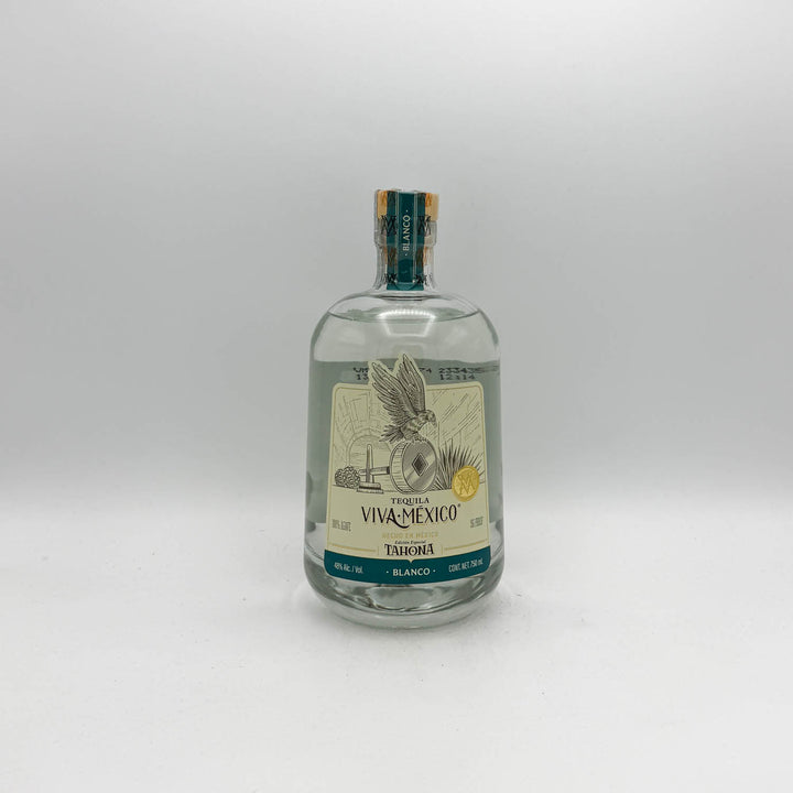 Tequila bottle with label on a white background
