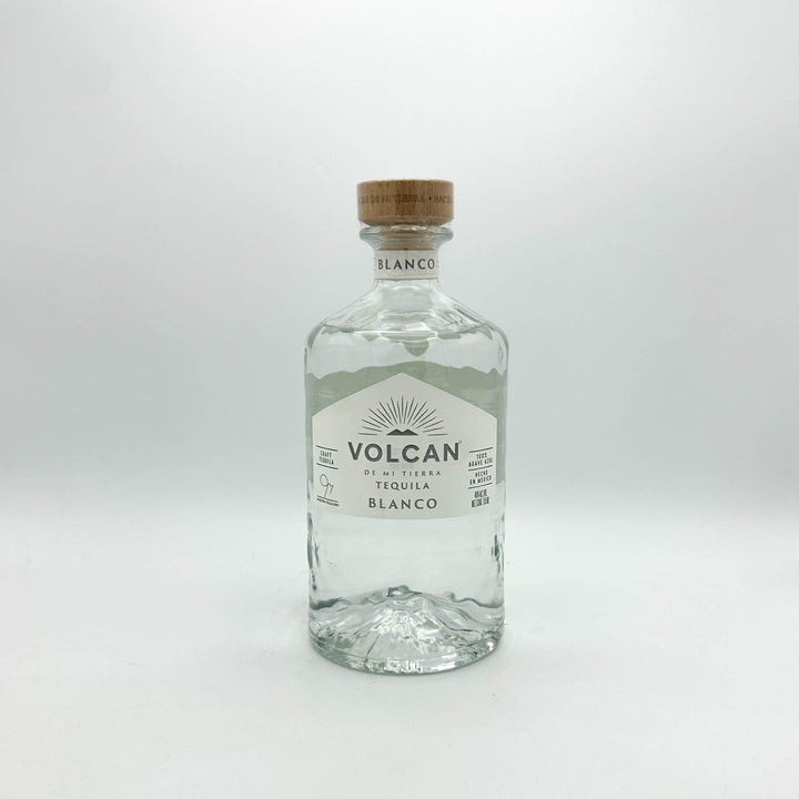 Volcan blanco tequila bottle on a white background