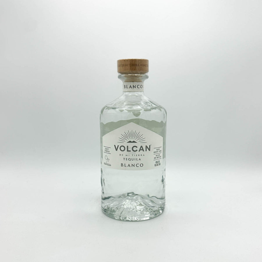 Volcan blanco tequila bottle on a white background