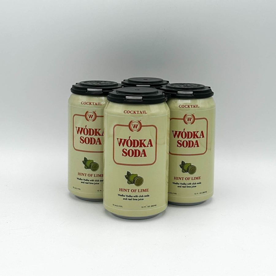 Four cans of Vodka Soda with lime hint on a white background